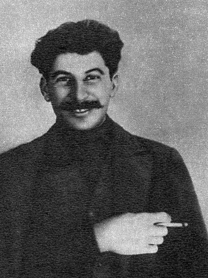 Stalin enjoying a rolled cigarette, 1915.