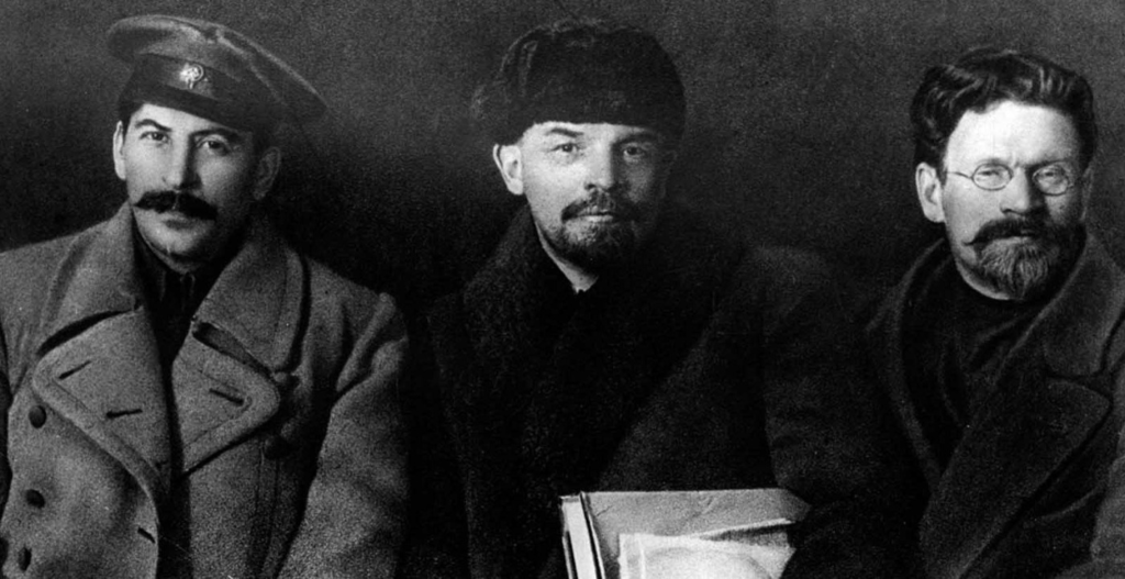 Stalin poses with Vladimir Lenin and Mikhail Kalinin, 1919.
