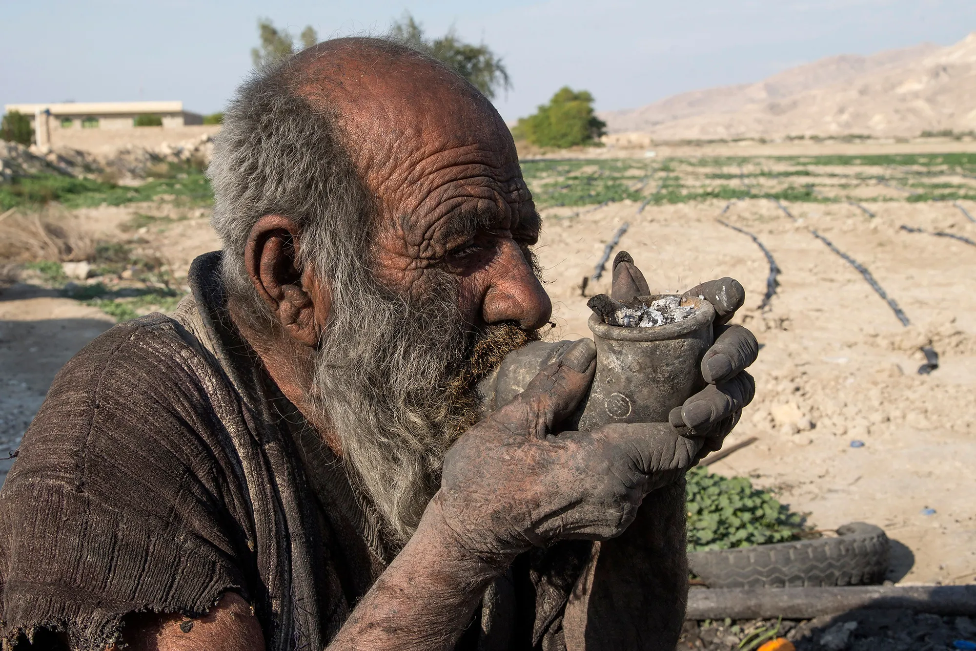 Amou Haji: The man who didn’t shower for 67 years