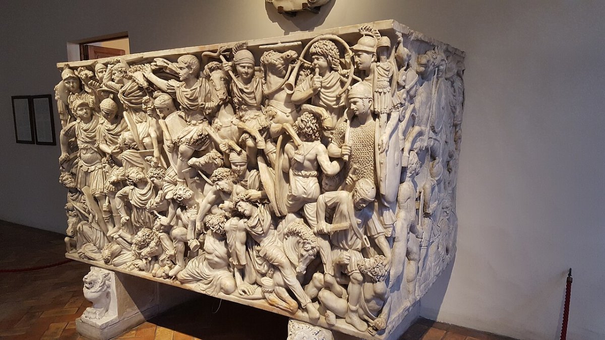 The Ludovisi Battle Sarcophagus, a crowded marble relief of Roman cavalry and infantry overwhelming long-haired barbarian warriors