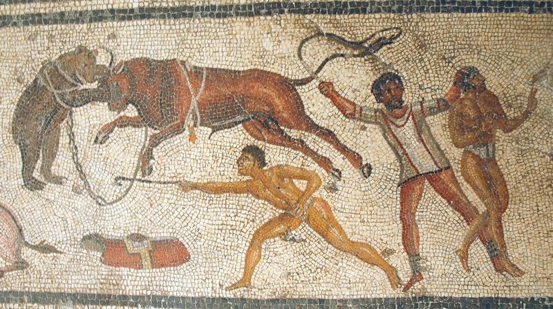 Roman mosaic of arena attendants with whips driving a bull and a bear that are chained together