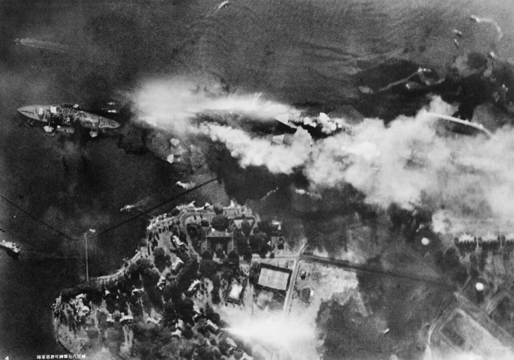 Vertical aerial photograph of Battleship Row at Pearl Harbor taken from a Japanese aircraft during the attack