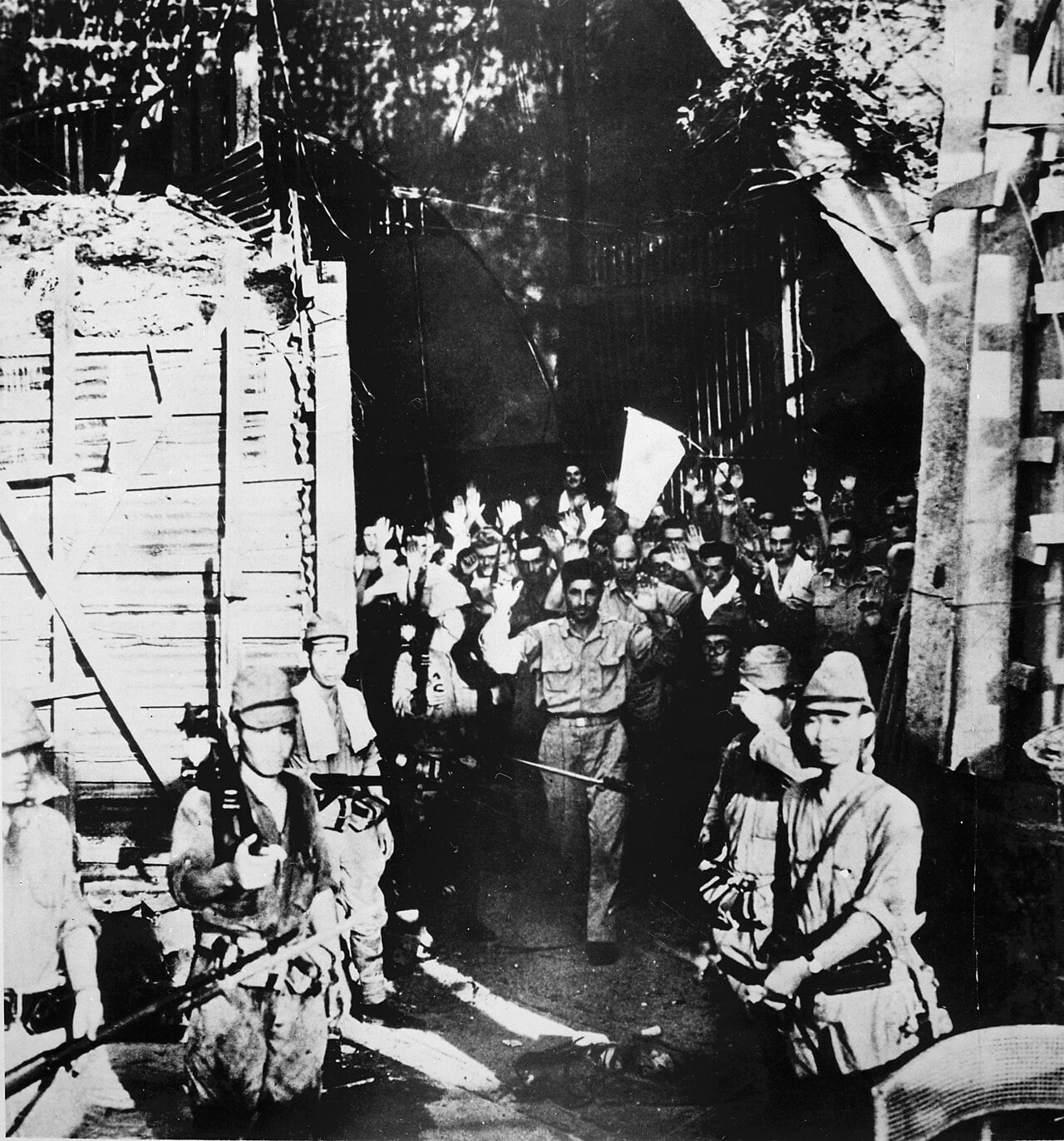 A column of American troops surrendering at Corregidor in the Philippines
